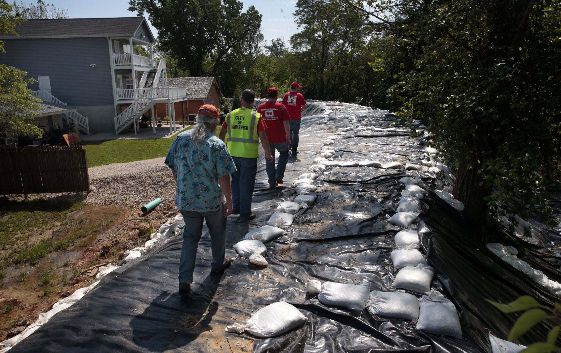 Mississippi River floodwater held at bay by Kimmswick levee